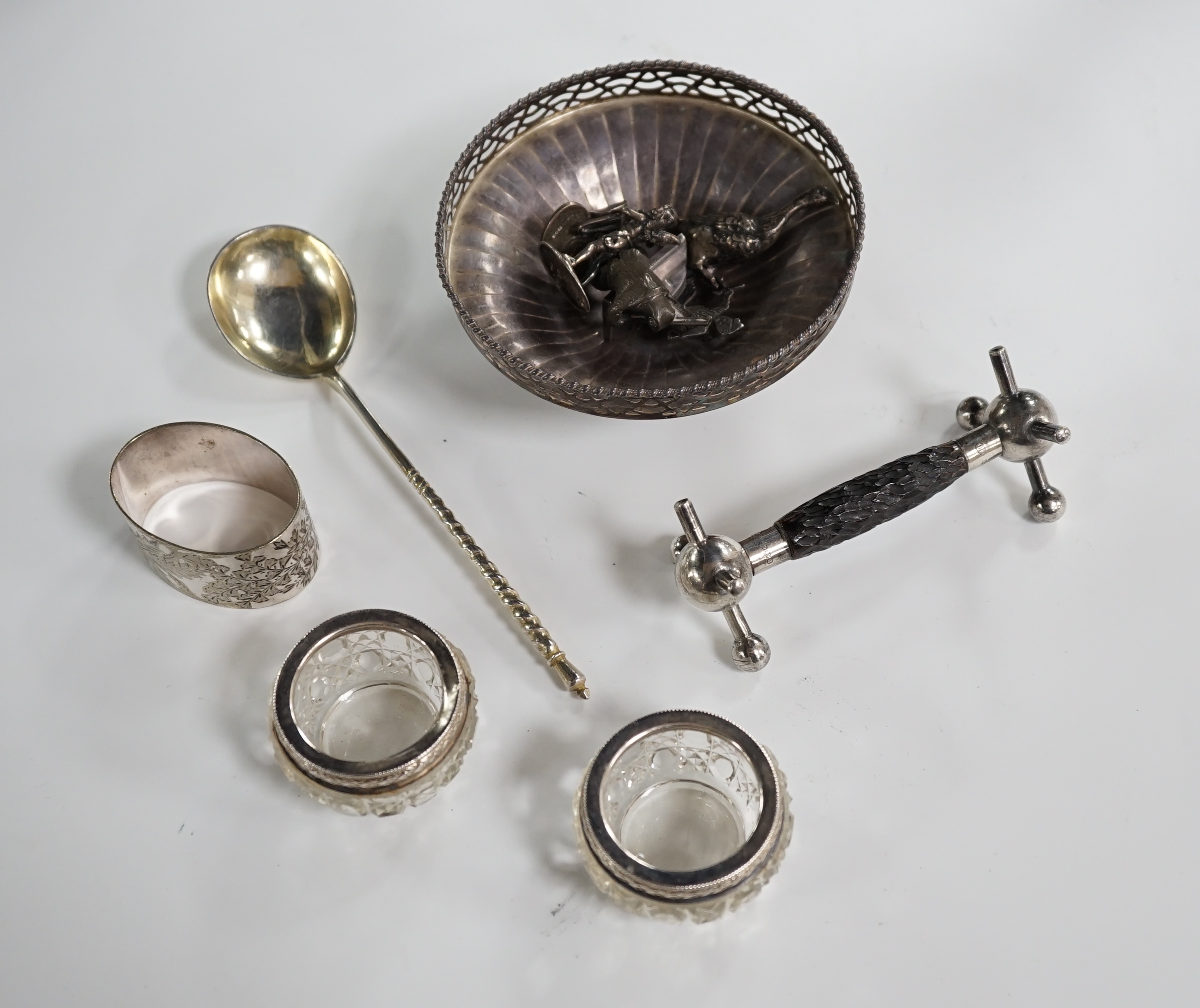 A late 19th century Russian engraved 84 zolotnik spoon, dated 1890, 16.8cm, a silver bowl with pierced border, two Edwardian silver miniature figures, duck and cherub, a modern silver model of a frog and an 800 German me